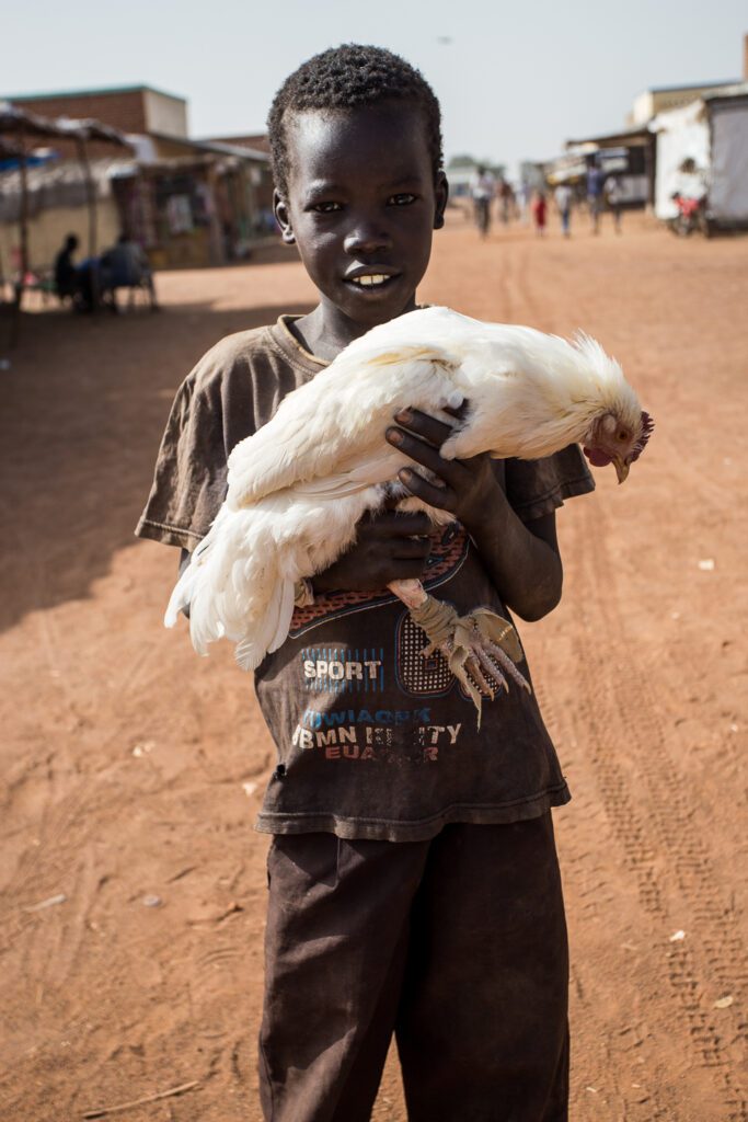 Chlapec a zvíře  v Jižním Súdánu